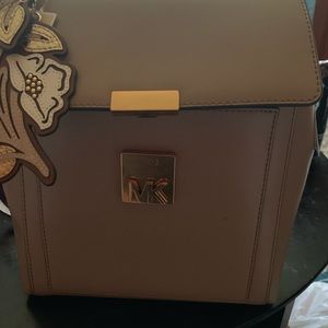 Michael Kors backpack with charm